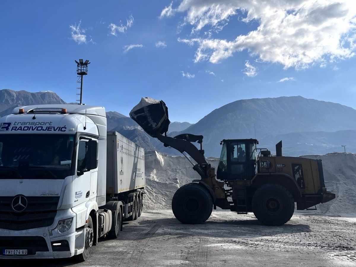 Bulk cargo being loaded onto a truck in the Port of Bar